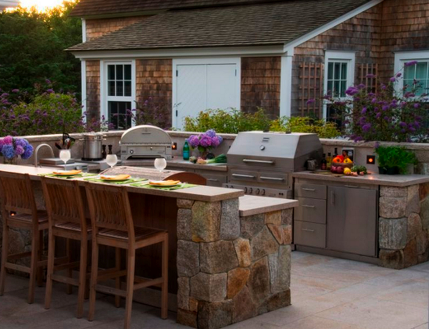 Outdoor kitchen with bar seating